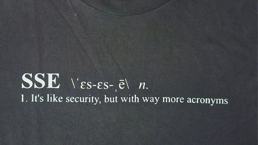Black t-shirt with white text defining 'SSE' and its humorous description.