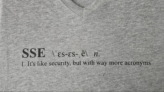Gray V-neck shirt with black text defining 'SSE' and its humorous description.